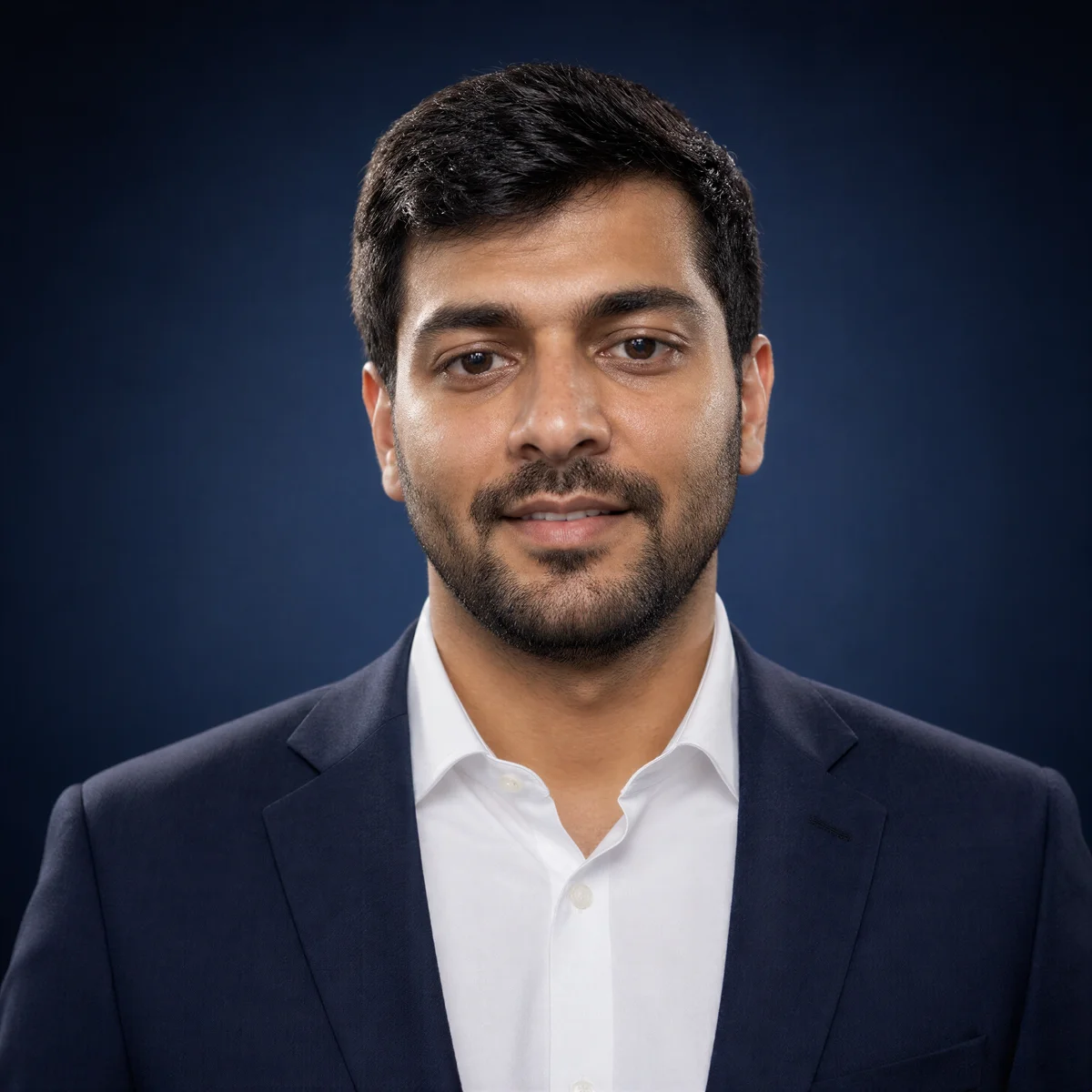 Business Formal headshot on Solid Navy background